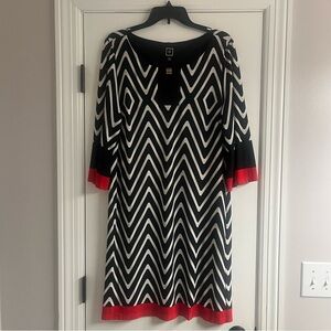 Chic Black and White Chevron Dress with Red Accents